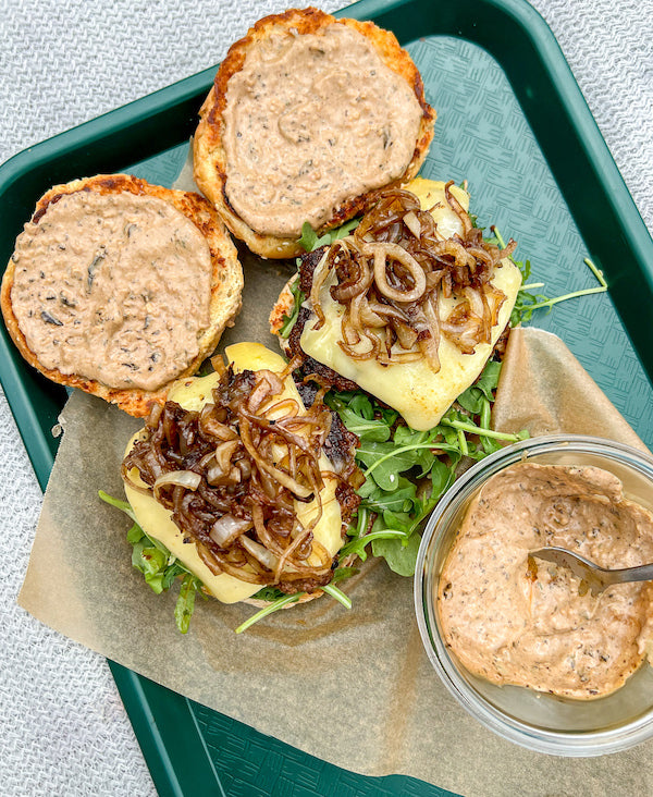 Cheeseburgers with Black Garlic Aioli and Caramelized Onions
